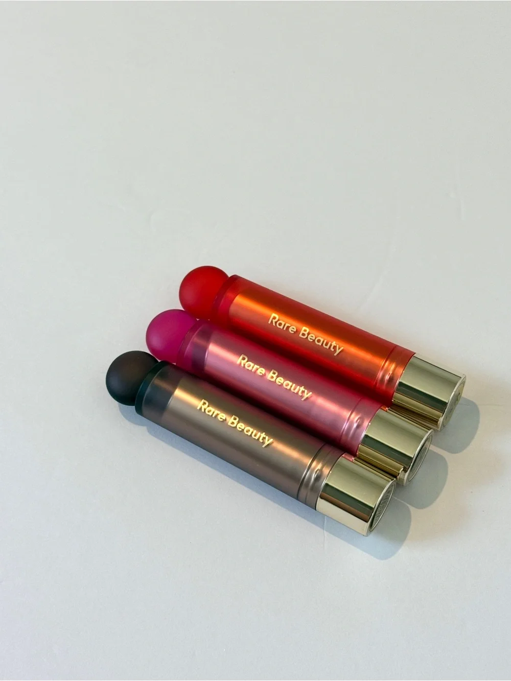 New rare beauty lip oil stick